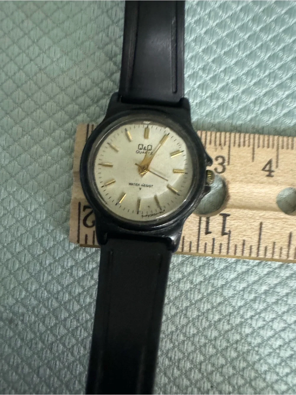 Q&Q Black and Gold Analog Quartz Watch for Everyday Wear